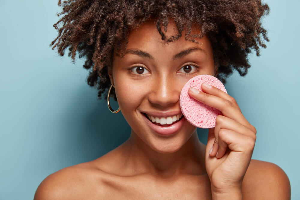 Woman exfoliating