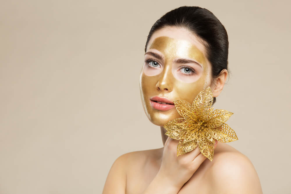 woman gold facemask