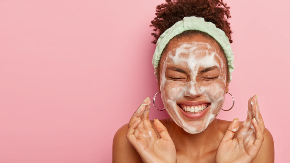 woman washing face